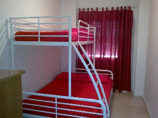 dormitorio litera tres plazas
