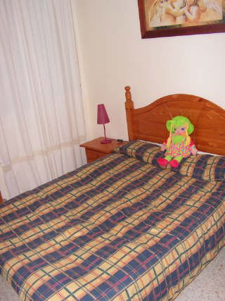 cama en habitacion piso portil