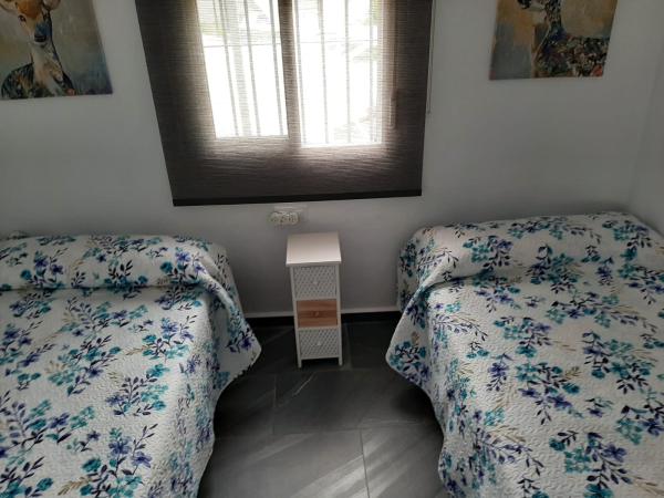 2 dormitorio con camas de 90