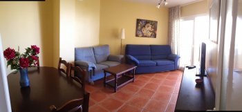 Vista de salón-comedor y acceso a terraza