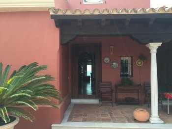 Porche Chalet primera linea playa matalascaas con jardin